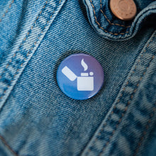 Load image into Gallery viewer, A badge on a jean jacket with a blue background and a lighter illustration in white. 