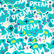 Load image into Gallery viewer, Vinyl die cut stickers with the word &quot;dream&quot; featured inside an illustrated cloud-shape with cute sketchy items around. 