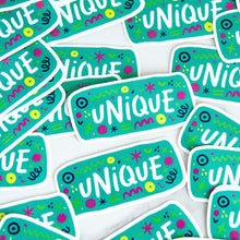 Load image into Gallery viewer, Vinyl die cut stickers with the word &quot;unique&quot; and sketchy elements surrounding the word. 