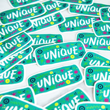 Load image into Gallery viewer, Vinyl die cut stickers with the word &quot;unique&quot; and sketchy elements surrounding the word. 