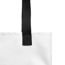 Load image into Gallery viewer, A close up of the black handle of the tote bag.