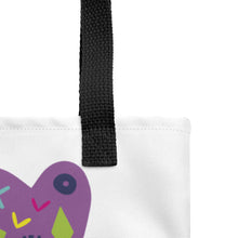 Load image into Gallery viewer, A close up of the black handle of the tote bag.