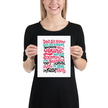 Load image into Gallery viewer, A woman holding a white art print. The print reads &quot;Don&#39;t let anyone put you down because you are young, but set an example for the believers, in speech, in life, in love, in faith and in purity.&quot;