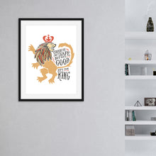Load image into Gallery viewer, A black from with artwork inside with a white background hanging on the wall. A shelf is off to the right side. The artwork features an illustrated with the words &quot;Course He Isn&#39;t Safe, But He&#39;s Good. He&#39;s the King.&quot;