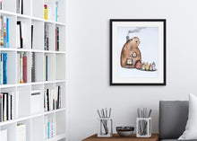 Load image into Gallery viewer, A black frame featured in a room with a bookshelf. The frame features an illustration of the beavers house shaped like a beaver with the four children walking up to it. 