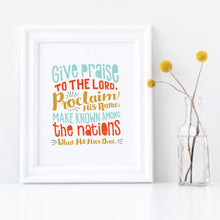 Load image into Gallery viewer, Artwork in a white frame with the artwork printed on white paper and colorful hand drawn lettering with the Psalm 105:1 &quot;Give praise to the Lord, proclaim his name; make known among the nations what he has done.&quot;