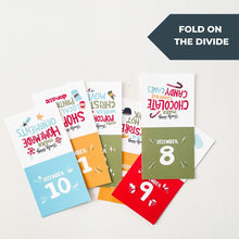 Load image into Gallery viewer, A photo of the cards and hands folding one of the cards with the words &quot;fold on the divide.&quot;