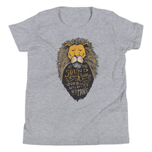 Load image into Gallery viewer, A light grey T-Shirt lays on a white background. The T-Shirt features hand drawn illustration of the Chronicles of Narnia lion character Aslan. Inside the illustration there is the quote “At The Sound of Your Roar, Sorrows Will Be No More.”