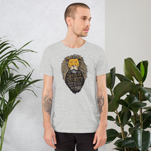 Load image into Gallery viewer, A man wearing a light grey T-Shirt. The T-Shirt features hand drawn illustration of the Chronicles of Narnia lion character Aslan. Inside the illustration there is the quote “At The Sound of Your Roar, Sorrows Will Be No More.”