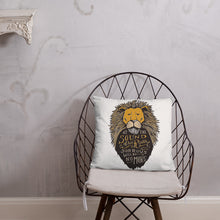 Load image into Gallery viewer, A white pillow featured on a wire chair. The pillow artwork features hand drawn illustration of the Chronicles of Narnia lion character Aslan. Inside the illustration there is the quote “At The Sound of Your Roar, Sorrows Will Be No More.”