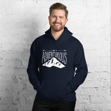 Load image into Gallery viewer, A man wearing a navy hoodie with lettering and illustration in white with the phrase “Be Adventurous” with arrows pointing to the word “be” and a mountain illustration underneath the word “adventure.”