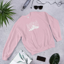 Load image into Gallery viewer, A light pink sweatshirt laying with jeans and shoes. The navy hoodie includes the phrase “Be Adventurous” in white with arrows pointing to the word “be” and a mountain illustration underneath the word “adventure.”