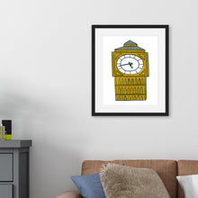 Load image into Gallery viewer, A black frame with illustration in the inside of the frame of Big Ben. The illustration is surrounded by white. The frame is featured on a wall above a sofa with a side table. 