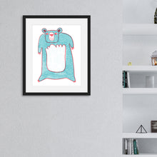 Load image into Gallery viewer, An illustration of a light blue bear in a black frame. The frame is hanging on the wall next to a bookshelf.