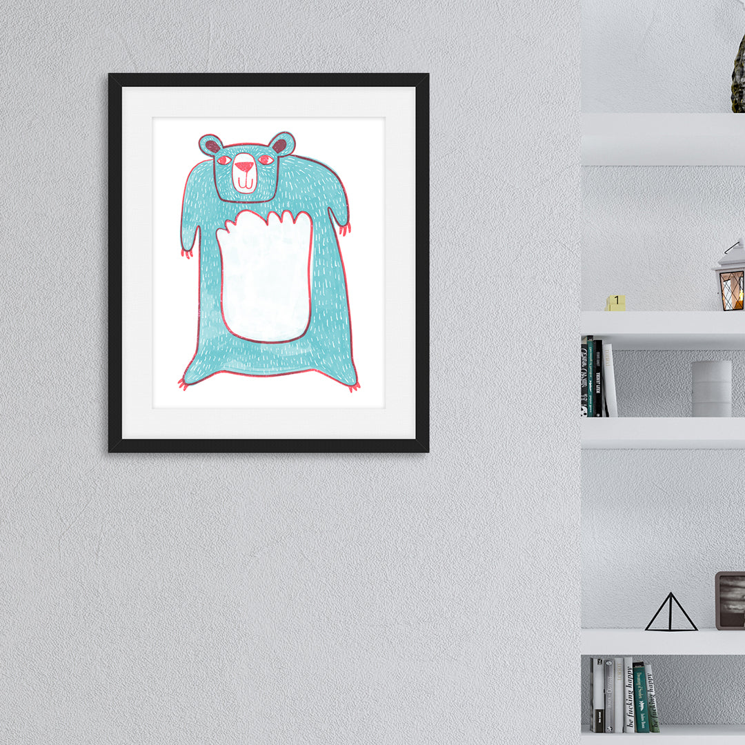 An illustration of a light blue bear in a black frame. The frame is hanging on the wall next to a bookshelf.