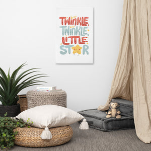 A canvas shown on a wall in a kids' room. The canvas is white and features hand drawn lettering reading "Twinkle Twinkle Little Star" The word star features a "star" for the A. 