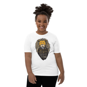 A girl wearing a white short sleeved T-Shirt. The T-Shirt features hand drawn illustration of the Chronicles of Narnia lion character Aslan. Inside the illustration there is the quote “At The Sound of Your Roar, Sorrows Will Be No More.”