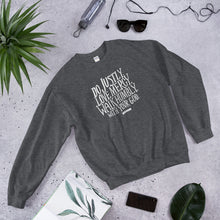 Load image into Gallery viewer, A dark grey Bible verse sweatshirt featuring Do justly, love mercy, walk humbly, with your God, Micah 6:8 in white lettering. 