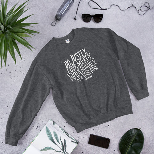 A dark grey Bible verse sweatshirt featuring Do justly, love mercy, walk humbly, with your God, Micah 6:8 in white lettering. 