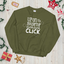 Load image into Gallery viewer, An olive green sweatshirt laying on a table with Christmas objects around it. The sweatshirt features the words &quot;Up on the housetop, click, click, click&quot; in white. There are three white stars around the letters. 