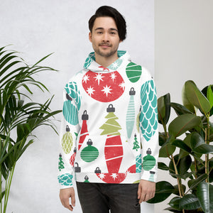 A man wearing a white hoodie with an illustrated ornament pattern featured all over the fabric including the hood. The colors of the ornaments are red, light green and dark green, blue and light blue. 