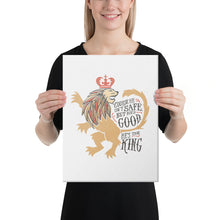 Load image into Gallery viewer, A woman holding a white canvas in her hands. The artwork features hand drawn illustration of the Chronicles of Narnia lion character Aslan. Inside the illustration there is the quote &quot;Course He Isn&#39;t Safe, But He&#39;s Good. He&#39;s the King.&quot;