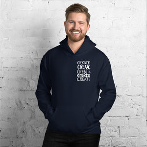 A man wearing a navy hoodie with the word "create, create, create, create, create" in white in a small rectangle on the upper left side.