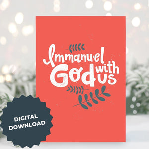 A Christmas card standing up with with pine leaves in the background with a touch of snow. The card has a light red background with the words "Immanuel God with Us" in white with a couple of plant leaves in navy around the words. The words 'digital download' are featured on top of the image.