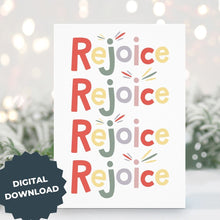 Load image into Gallery viewer, A Christmas card standing up with with pine leaves in the background with a touch of snow. The card has a white background and features the word &quot;rejoice&quot; repeated four times. The letters of the word are in different colors of muted red, yellow, green, purple and pink. The words &quot;digital download&quot; are on top of the image.