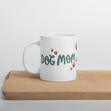 Load image into Gallery viewer, This white ceramic mug features the words Dog Mom with small hearts that look like paws around the words. It’s a fun mug to give any dog moms you know. 