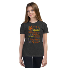 Load image into Gallery viewer, A girl wearing a dark grey short sleeved T-Shirt. The artwork features hand drawn lettering of the Narnia quote &quot;Once a king or queen of Narnia, always a king or queen of Narnia.&quot; 
