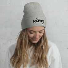 Load image into Gallery viewer, A light grey winter hat with the phrase Dog Mom on the hat’s cuff in black letters with black heart shaped paws around the phrase. The beanie hat makes an excellent gift for dog lovers. 