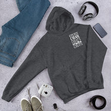Load image into Gallery viewer, A dark grey hoodie featuring the word &quot;create, create, create, create, create&quot; in white in a small rectangle on the upper left side.