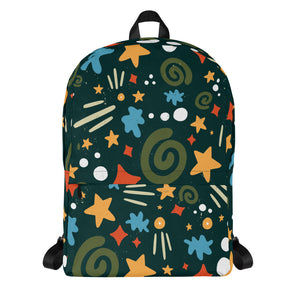 A backpack featured with a white background. The backpack is hunter green with a fun pattern of yellow stars, green swirls, blue "splats" and other fun whimsical shapes. The backpack straps are black. 