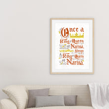 Load image into Gallery viewer, A light wood frame above a sofa. Artwork in a white frame with the with a white matte. The frame is leaning on a white counter. The artwork features hand drawn lettering of the Narnia quote &quot;Once a king or queen of Narnia, always a king or queen of Narnia.&quot;