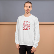 Load image into Gallery viewer, A man wearing a white sweatshirt featuring hand drawn lettering with the words &quot;Up on the housetop, click, click, click&quot; in red. There are three blue stars around the words. 