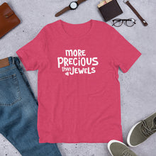 Load image into Gallery viewer, A raspberry pink T-shirt featuring the phrase More Precious Than Jewels inspired by Proverbs 3:15-18. The words are in white on the shirt with a small drawn jewel in the corner of the words. This tee makes a lovely Christian women’s gift. 