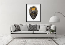 Load image into Gallery viewer, A black frame with artwork hanging above a light grey sofa in a living room. The artwork features an illustrated Aslan (the lion from Chronicles of Narnia). Inside the lion the Narnia quote is featured reading “At The Sound of Your Roar, Sorrows Will Be No More.”
