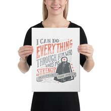 Load image into Gallery viewer, A woman holding a canvas in her hands with the words &quot;I can do everything through him who gives me strength&quot; and Philippians 4:13 at the bottom of the verse. 