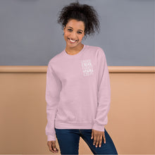 Load image into Gallery viewer, A woman wearing a light pink sweatshirt with the word &quot;create, create, create, create, create&quot; in white in a small rectangle on the upper left side.