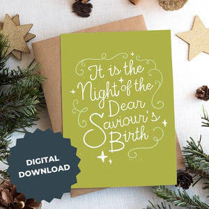 A photo of a Christmas card on top of a brown paper wrapped gift with Christmas decor around it. The background of the card is a lime green with the word "it is the night of the dear saviour's birth" in script white lettering. The words "digital download" are on top of the image.