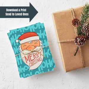 A stack of Christmas cards with brown string wrapped around them. A brown craft paper gift is off to the side. The card has a blue background with the words 'ho ho ho' in a lighter shade of blue. On top of the background is an illustrated Santa Claus with the words "Merry Christmas" in his beard. The words "download & print, send to loved ones" are featured in the upper left hand corner. 
