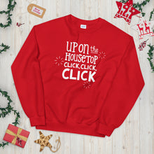 Load image into Gallery viewer, A red sweatshirt laying on a table with Christmas objects around it. The sweatshirt features the words &quot;Up on the housetop, click, click, click&quot; in white. There are three white stars around the letters. 