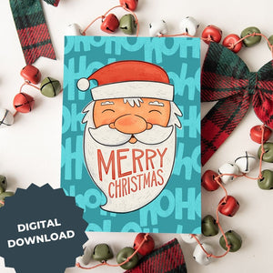 A Christmas card featured on top of some red and white Christmas decorations. The card has a blue background with the words 'ho ho ho' in a lighter shade of blue. On top of the background is an illustrated Santa Claus with the words "Merry Christmas" in his beard. The words "digital download" are on top of the image.