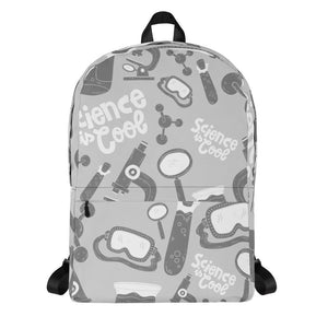 A backpack featured with a white background. The backpack is a light gray with a pattern of illustrations in darker gray and white. The pattern of illustrations features test tubes, microscopes, magnifying glasses, protective science goggles, atom models and the words "Science is cool."