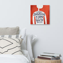 Load image into Gallery viewer, A red wall art canvas hangs on a white bedroom wall. The canvas design features the outline of a person in white, filled with light grey doodles. The words ‘There’s something in you the world needs&#39; are lettered in black across the person’s chest. Below the canvas is a white bed with lots of pillows, and a wooden sidetable holding a stack of books.