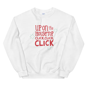 A white sweatshirt on a white background. The sweatshirt has the words "Up on the housetop, click, click, click" in red. There are three blue stars around the letters. 